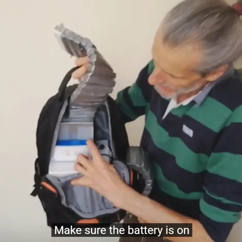 How to use the ComeBeCool Personal Cooling Backpack: switch on the battery
